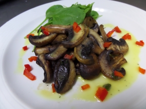 Variety of mushrooms with thyme,garlic & white wine